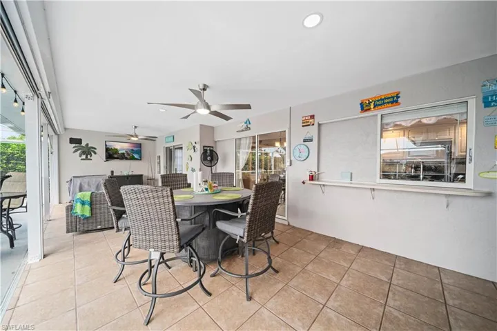 View of Lanai area with pass through window to kitchen