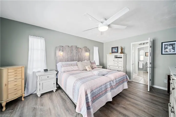 Primary Bedroom with tiled plank flooring