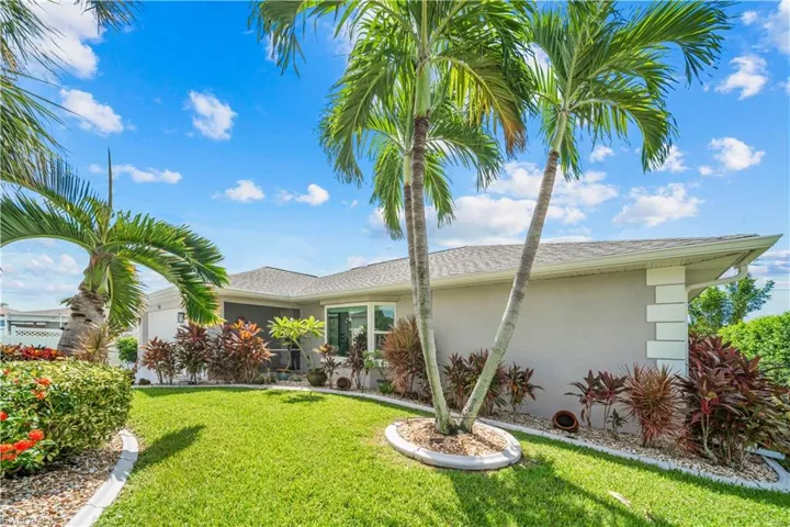 Front elevation showcasing mature landscaping