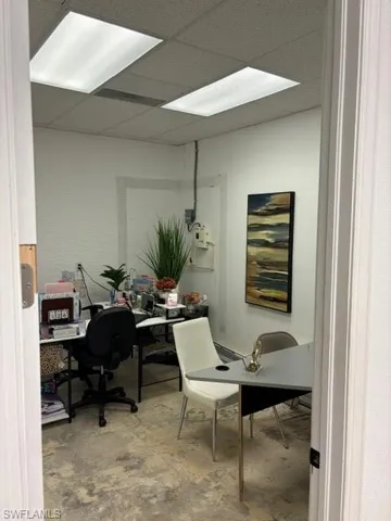 Office space featuring a paneled ceiling