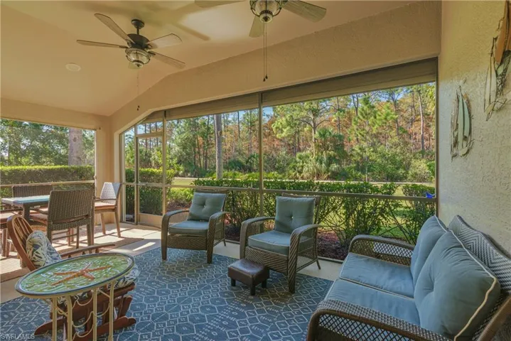 Sunroom with lofted ceiling and plenty of natural light