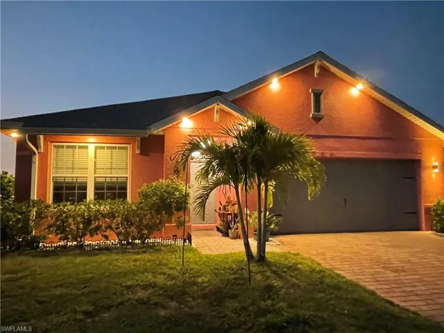 Front Of House With Parameter Lights On