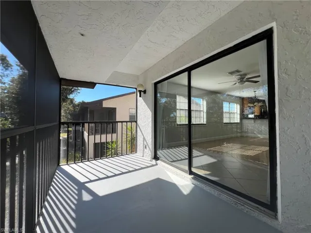 Balcony featuring a ceiling fan