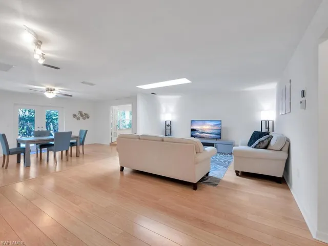 View of living room and dining room from the foyer