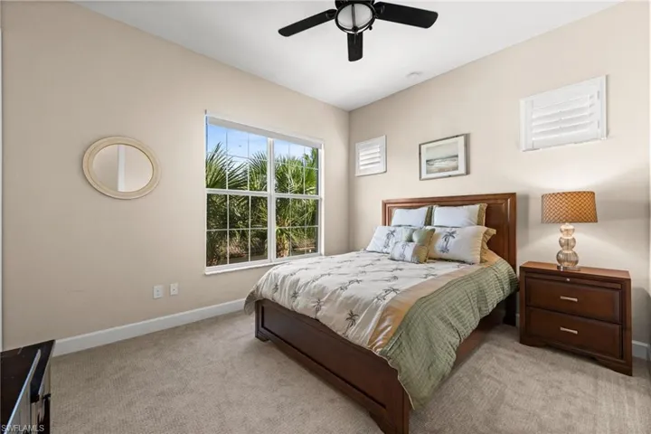 Second guest bedroom with lots of natural light and new plantation shutters