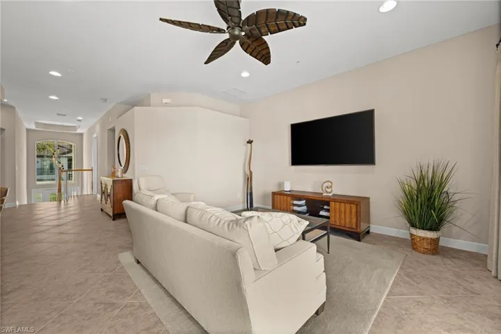 Living room open to kitchen and dining