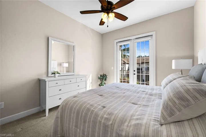 Large Guest bedroom with king bed, balcony and private bath