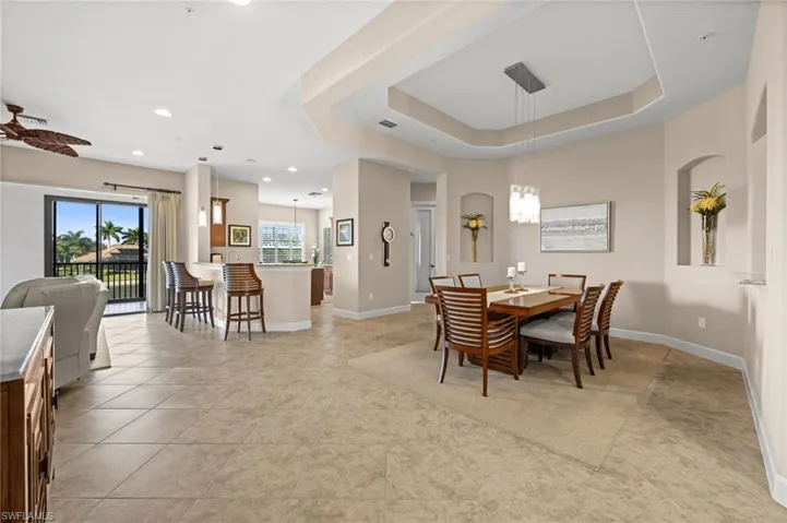 Open floor plan picture showing dining from foyer