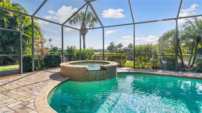 Pool and spa surrounded by water