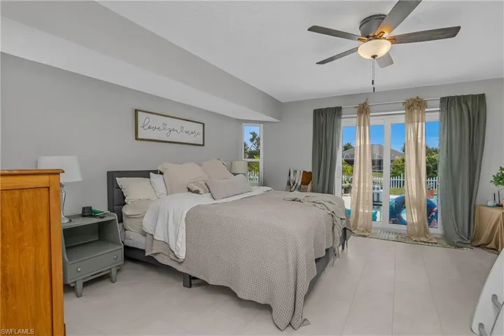 Main Suite with sliders to pool deck