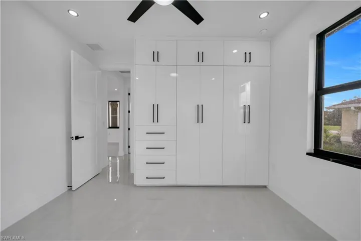 Unfurnished bedroom featuring recessed lighting and a ceiling fan