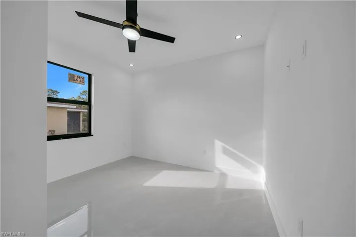 Unfurnished room with recessed lighting and ceiling fan
