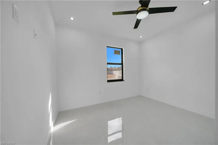 Spare room featuring recessed lighting and ceiling fan