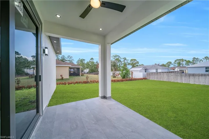 View of patio / terrace with a ceiling fan