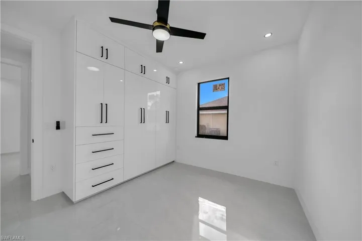 Unfurnished bedroom featuring recessed lighting and ceiling fan