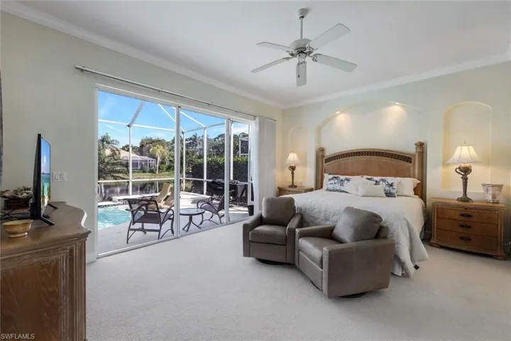 Primary Bedroom with volumious ceilings