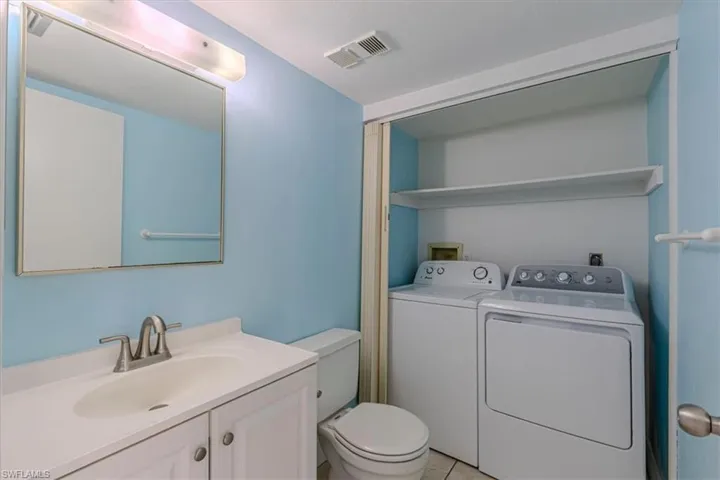 Downstairs 1/2 bath with access to laundry