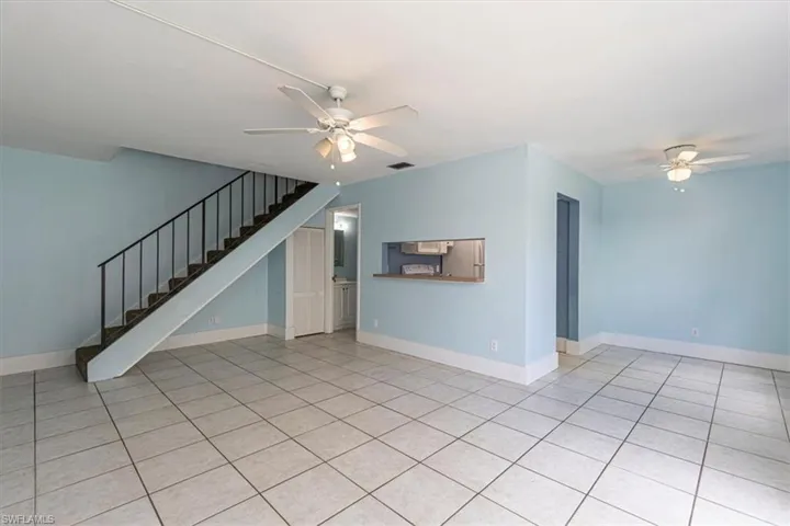 Living room featuring tile floors