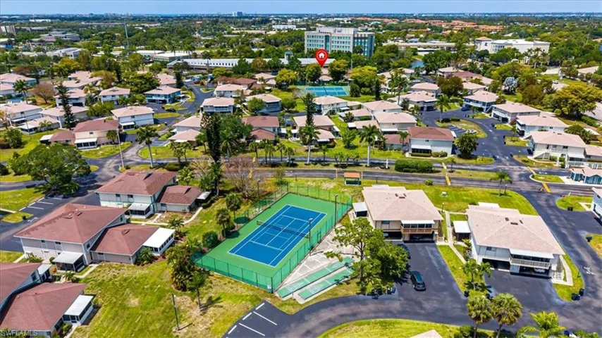 community amenities including Tennis, Pickleball, shuffleboard, two pools