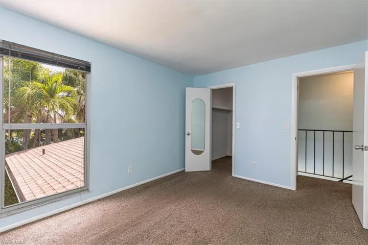 Upstairs bedroom with walk-in closet