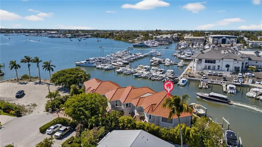 Bird's eye view of a marina and a large body of water