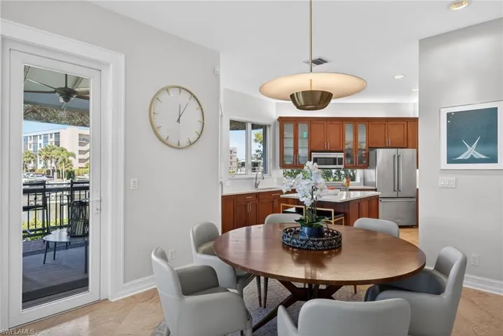 Dining area with recessed lighting and baseboards