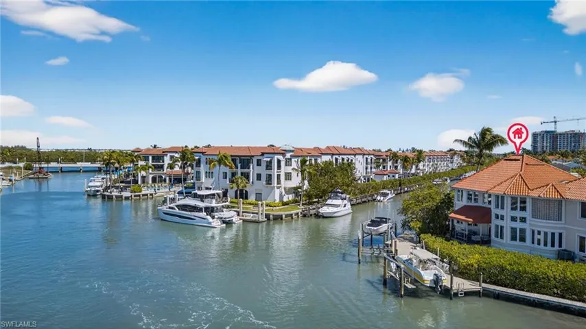 Water view featuring a boat dock and boat lift