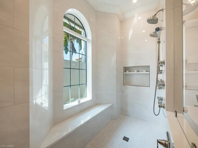 Primary bedroom en-suite bathroom walk-in shower