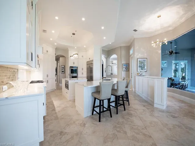 Kitchen showing breakfast bar and entertainment bar