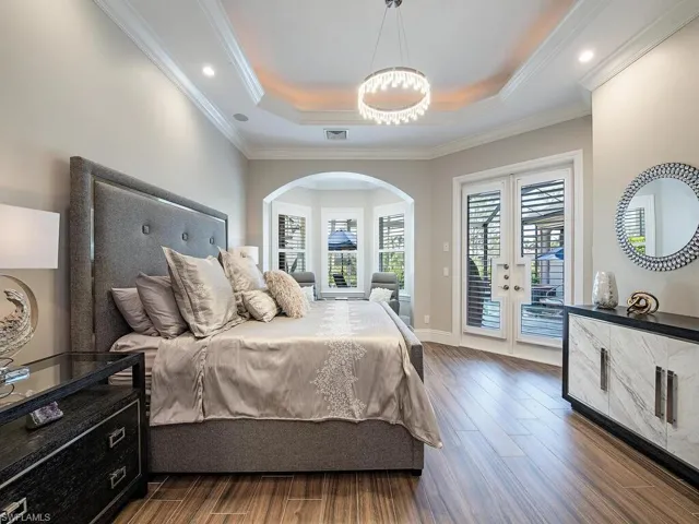 Primary Bedroom with sitting area and access to the lanai
