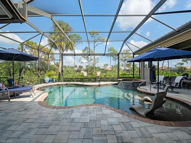 Plenty of room on this lanai, with pool, sun deck and hot tub