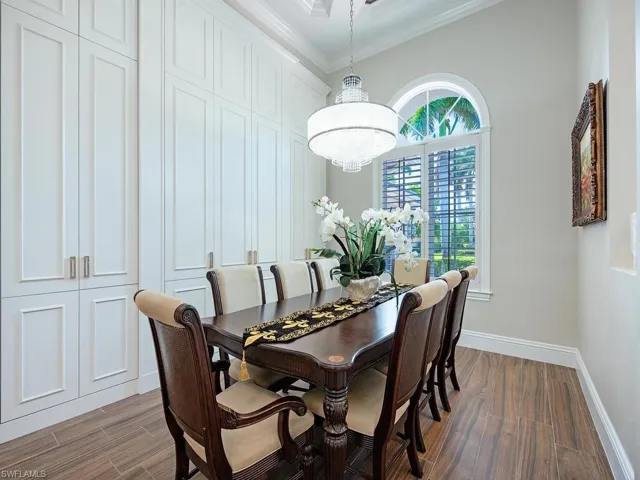 Formal dining room with beautifully designed storage