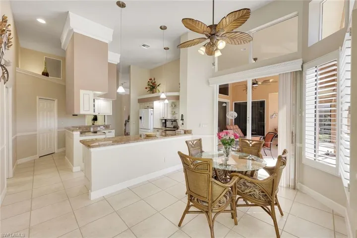 The informal dining area opens to the lanai.
