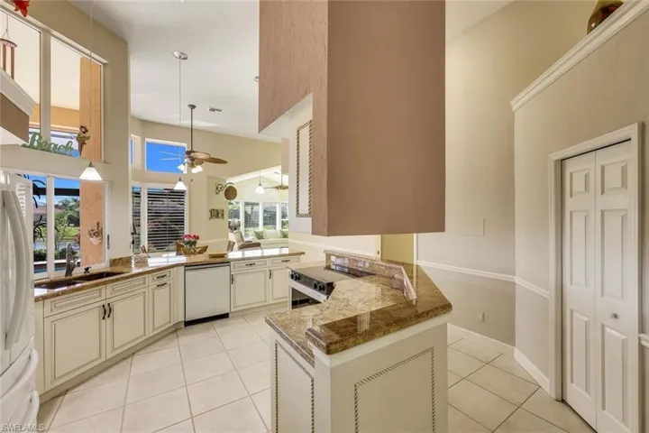 Through the kitchen is the family room/den.