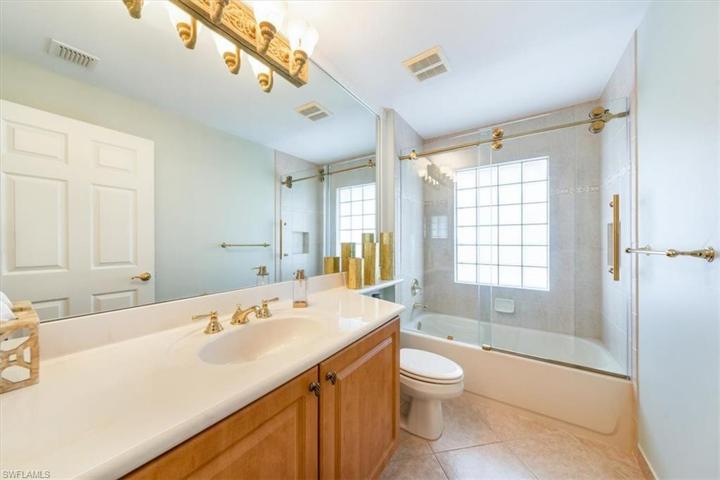 Guest Bath w/Frameless Shower doors.