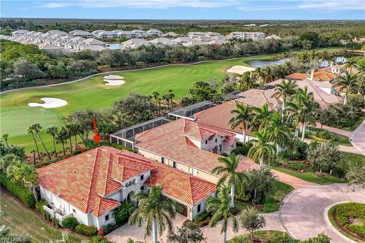 Aerial perspective of suburban area featuring a golf club