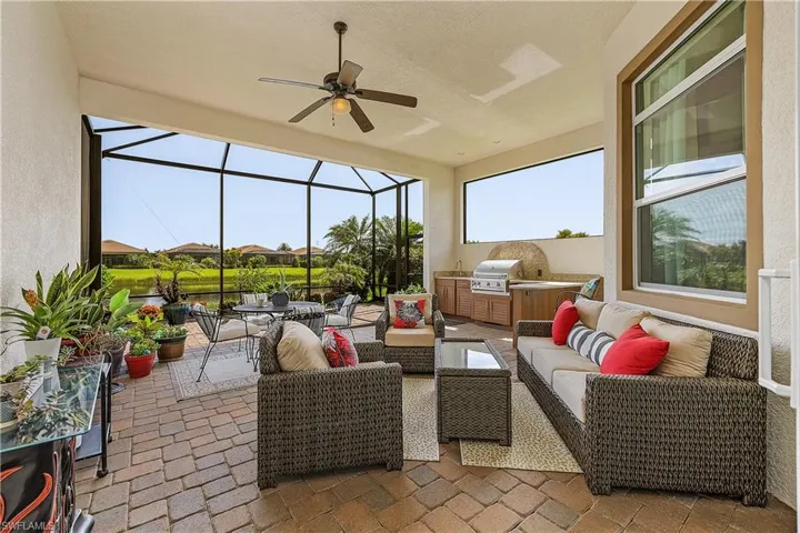 Sunroom / solarium with ceiling fan and a wealth of natural light