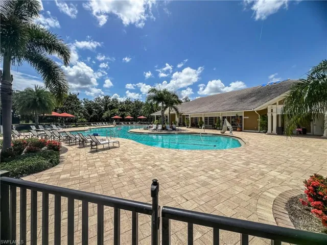 View of community pool featuring a patio area