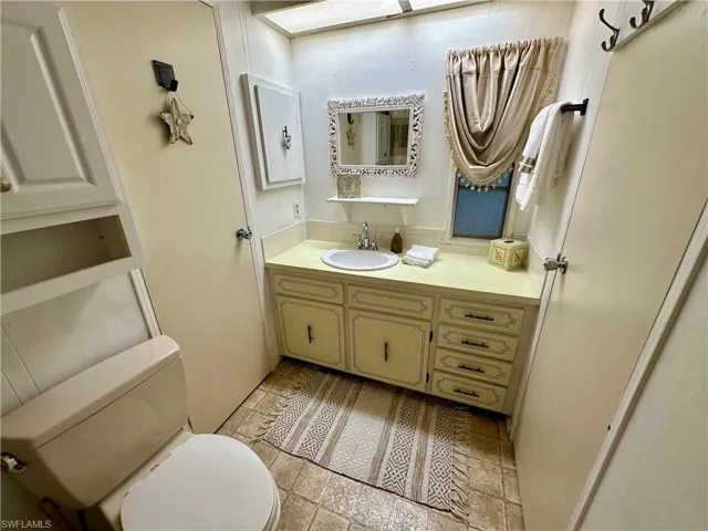 Guest Bathroom with dual entrance.