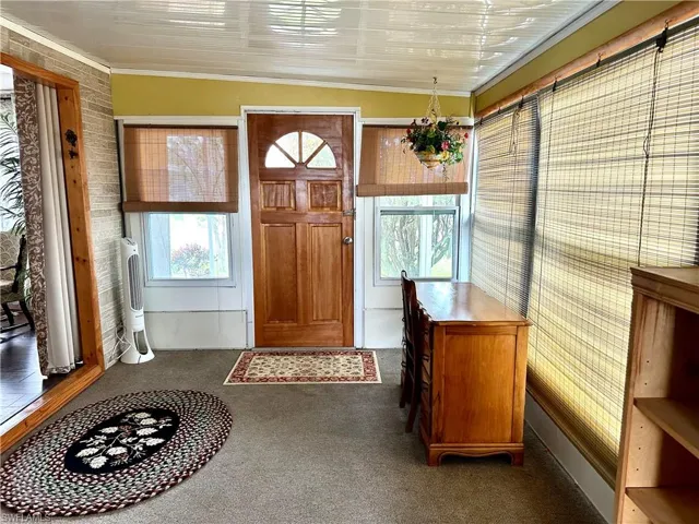 Entry way into the bonus room from outside and the Florida room