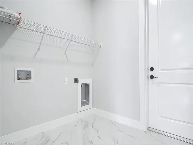 Laundry area featuring electric dryer hookup and washer hookup