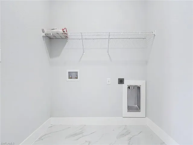 Laundry area with electric dryer hookup and washer hookup