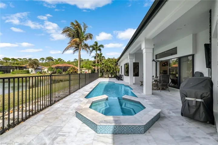 Spa with spillway into the pool