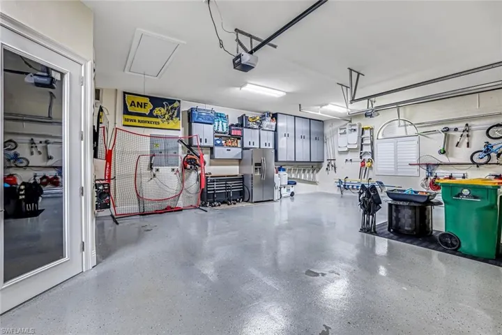Separate air conditioned storage or solon with a 3 car garage with plenty of cabinets