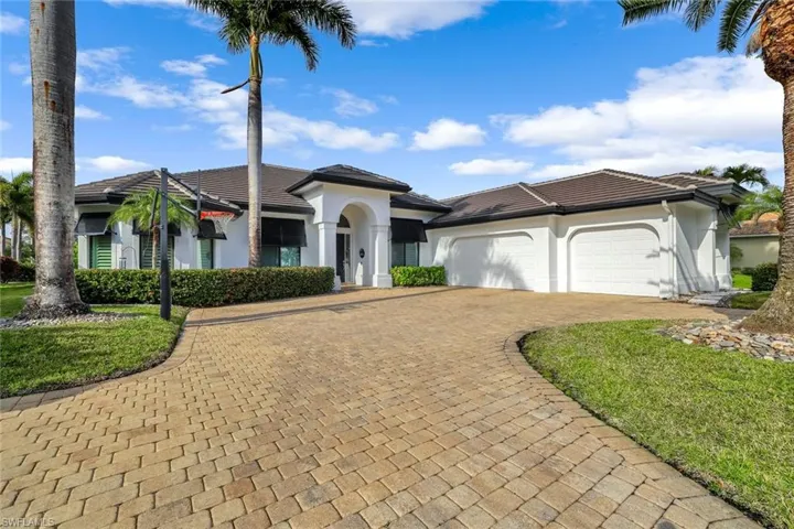 3 car garage with circular driveway