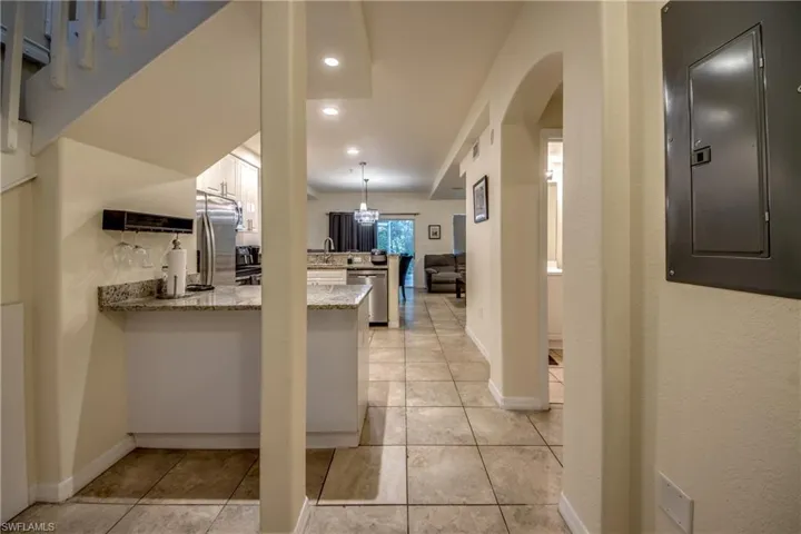 Foyer area opens into kitchen
