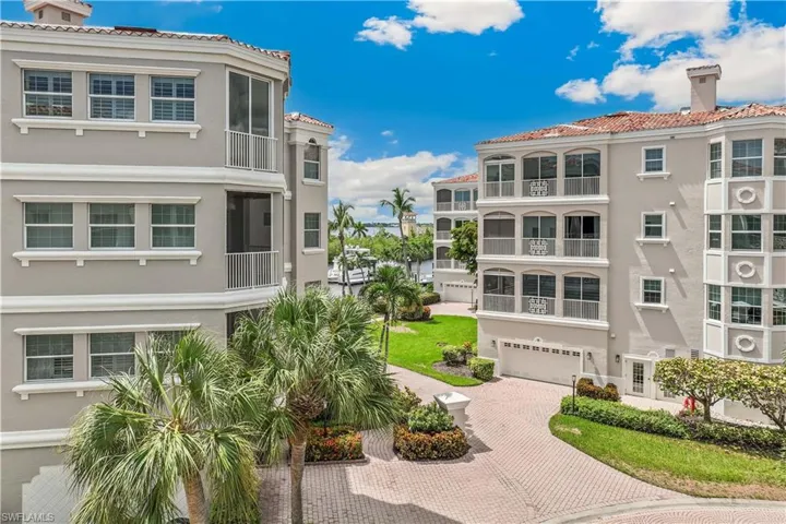 View of property featuring a garage