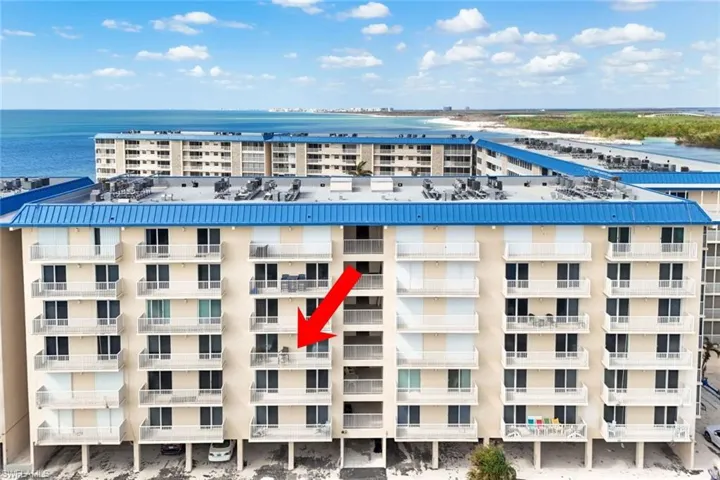 View of building exterior featuring a water view
