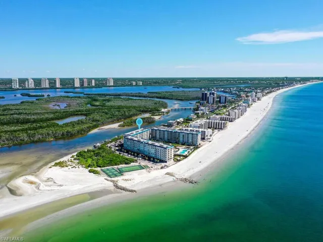 View of urban area with waterfront with a beach