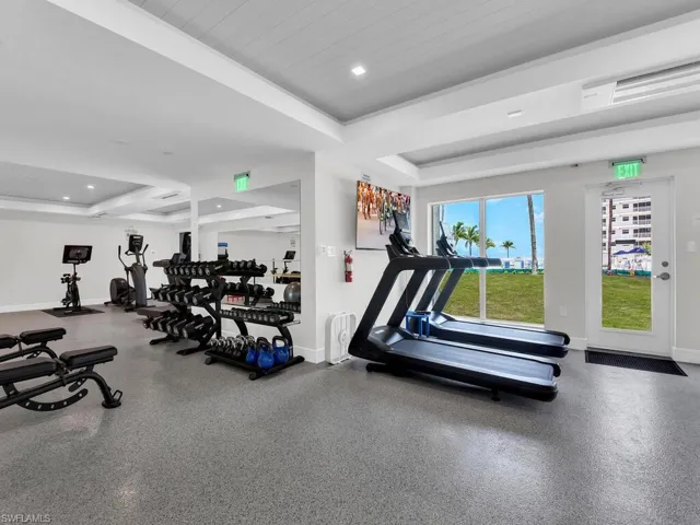 Workout area featuring recessed lighting